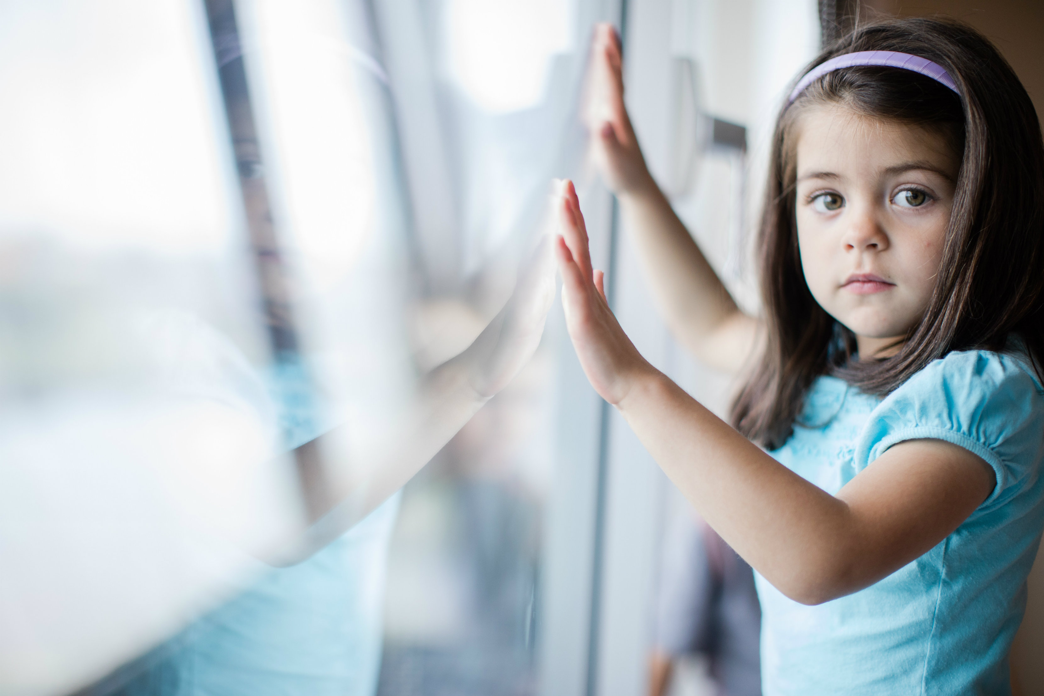 Girl looking out the window